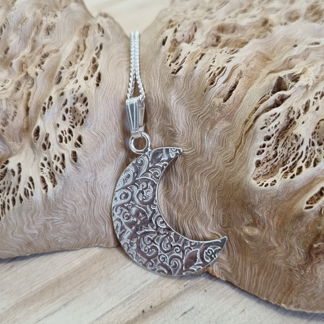 Crescent Moon Pendant in Sterling Silver