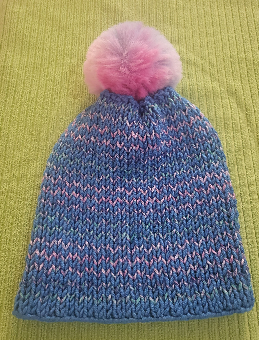 Beanie - soft blues and pink with pink and blue pom pom