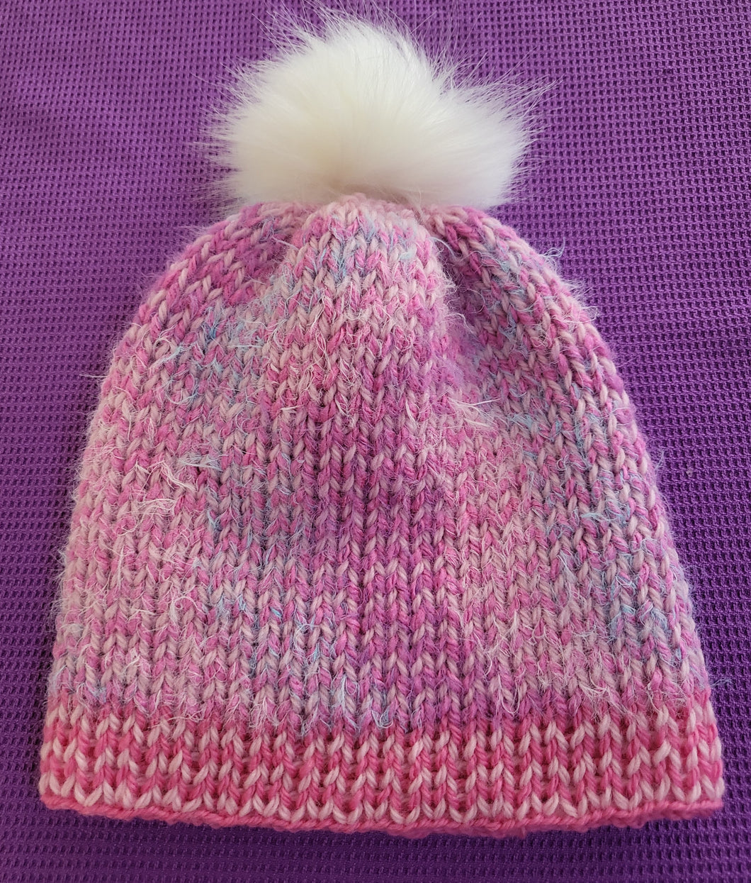 Shades of pink with a soft fluffy texture - beanie