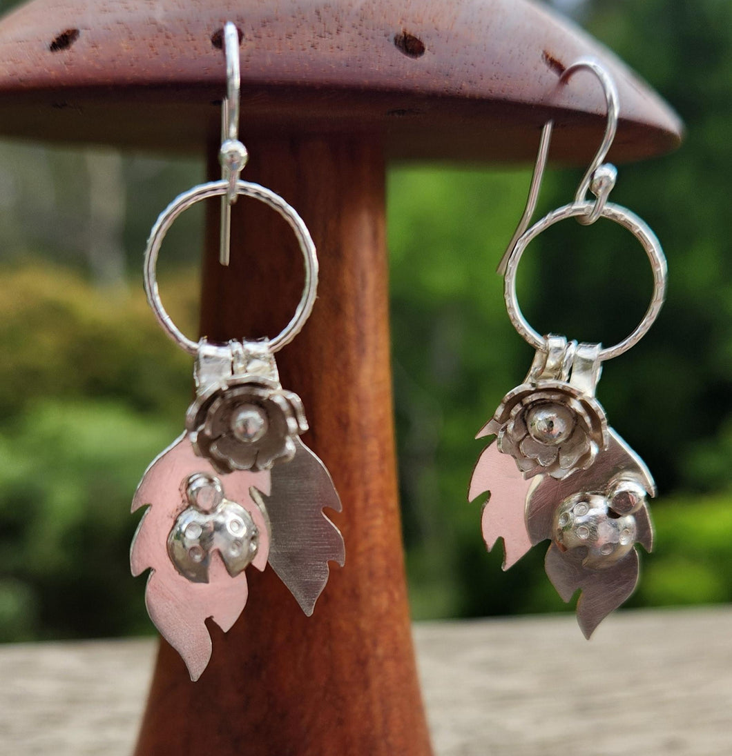 Ladybird and peony flower dangly earrings