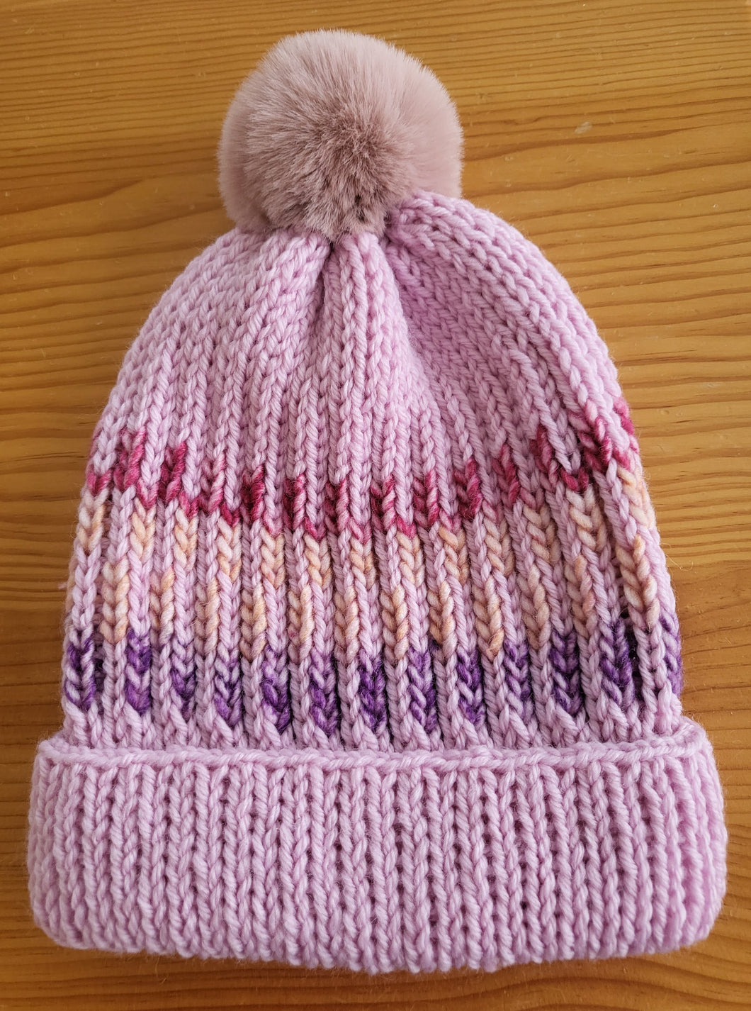 Beanie - pink with contrast colours and pink pom pom